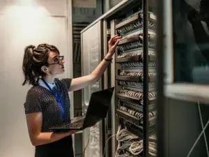 Woman working on Server